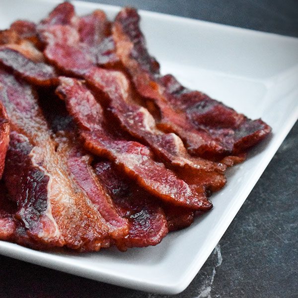 cooked beef bacon on a plate